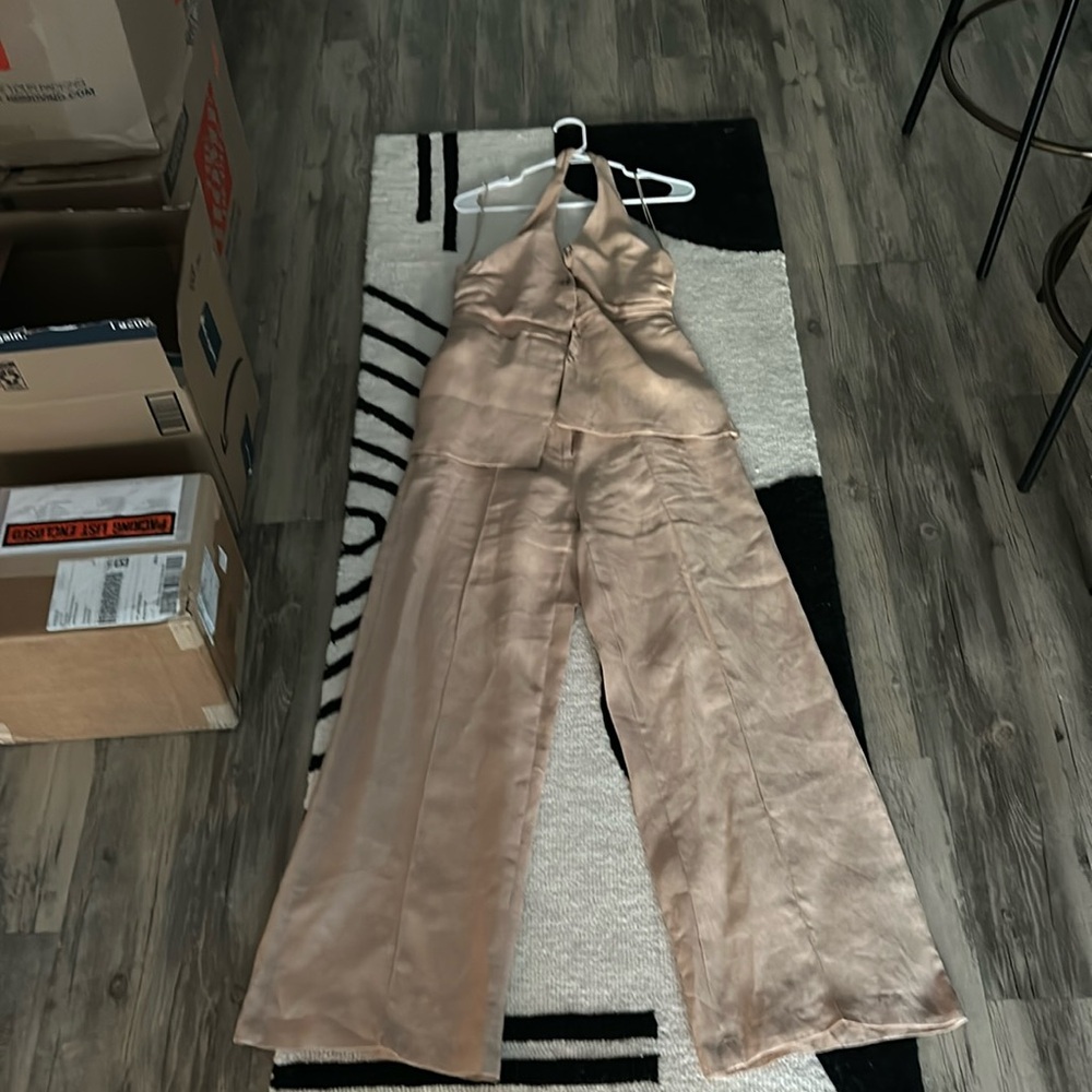 Perfect jump suit for date or girl’s night. Never worn.